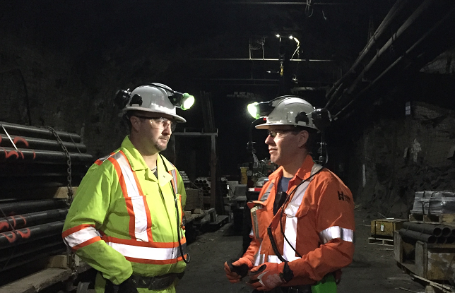 Two miners talking