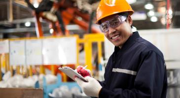 Worker in manufacturing plant