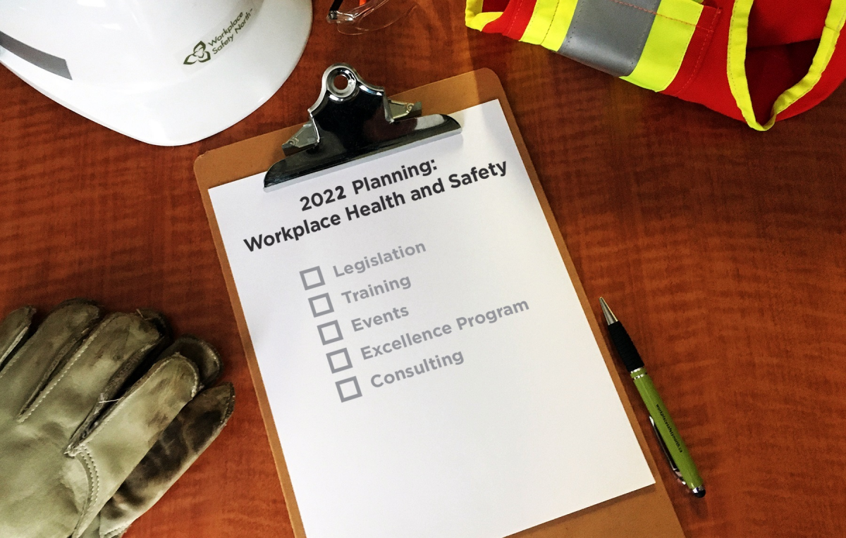 Hardhat and clipboard